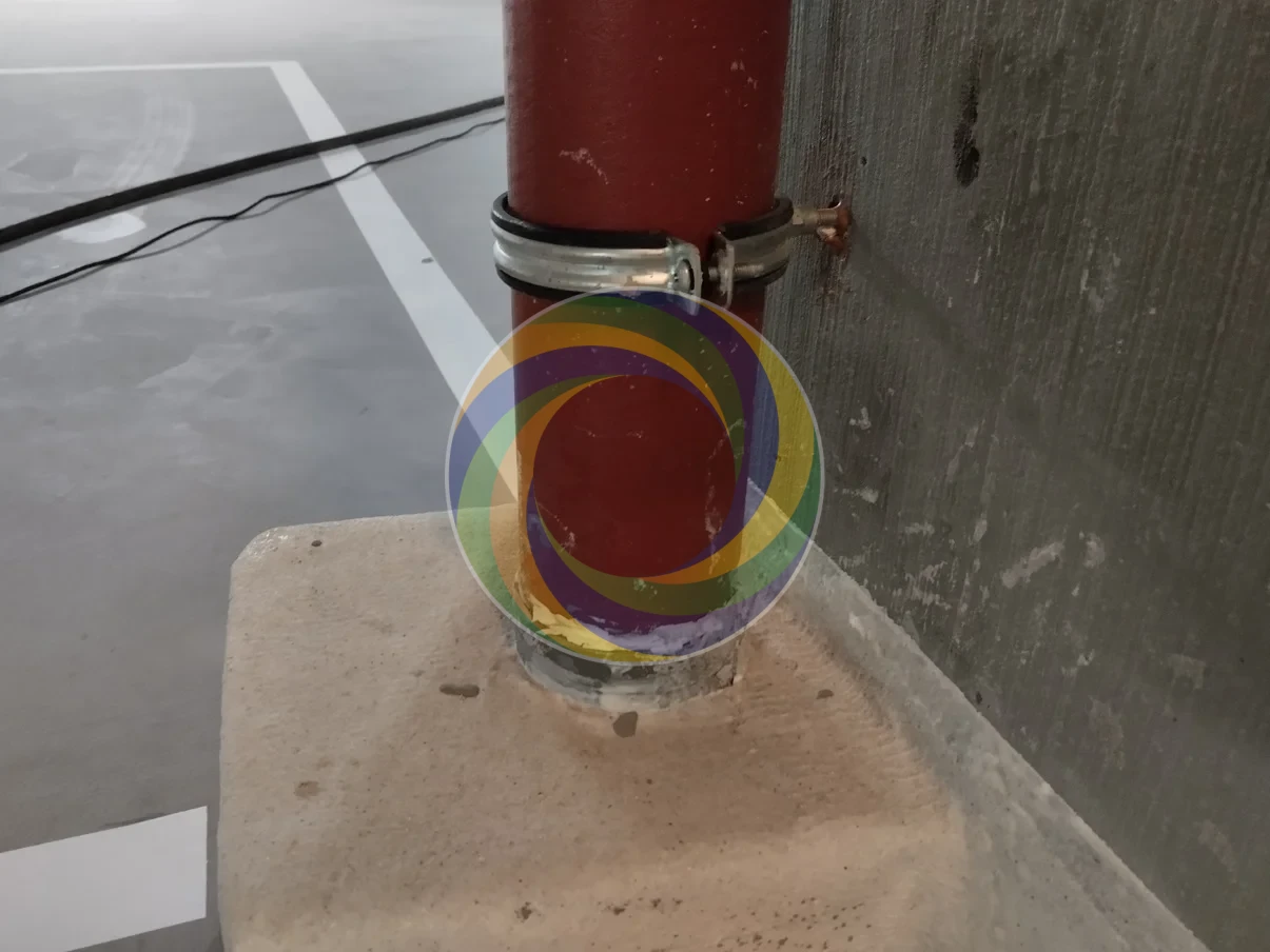 02-Nettoyage Conduites Evacuation Eau dans Garage Ciment